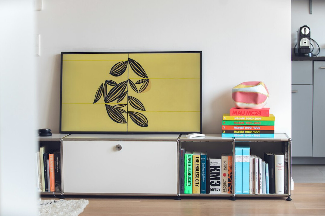 Television in a living room showing a streaming menu